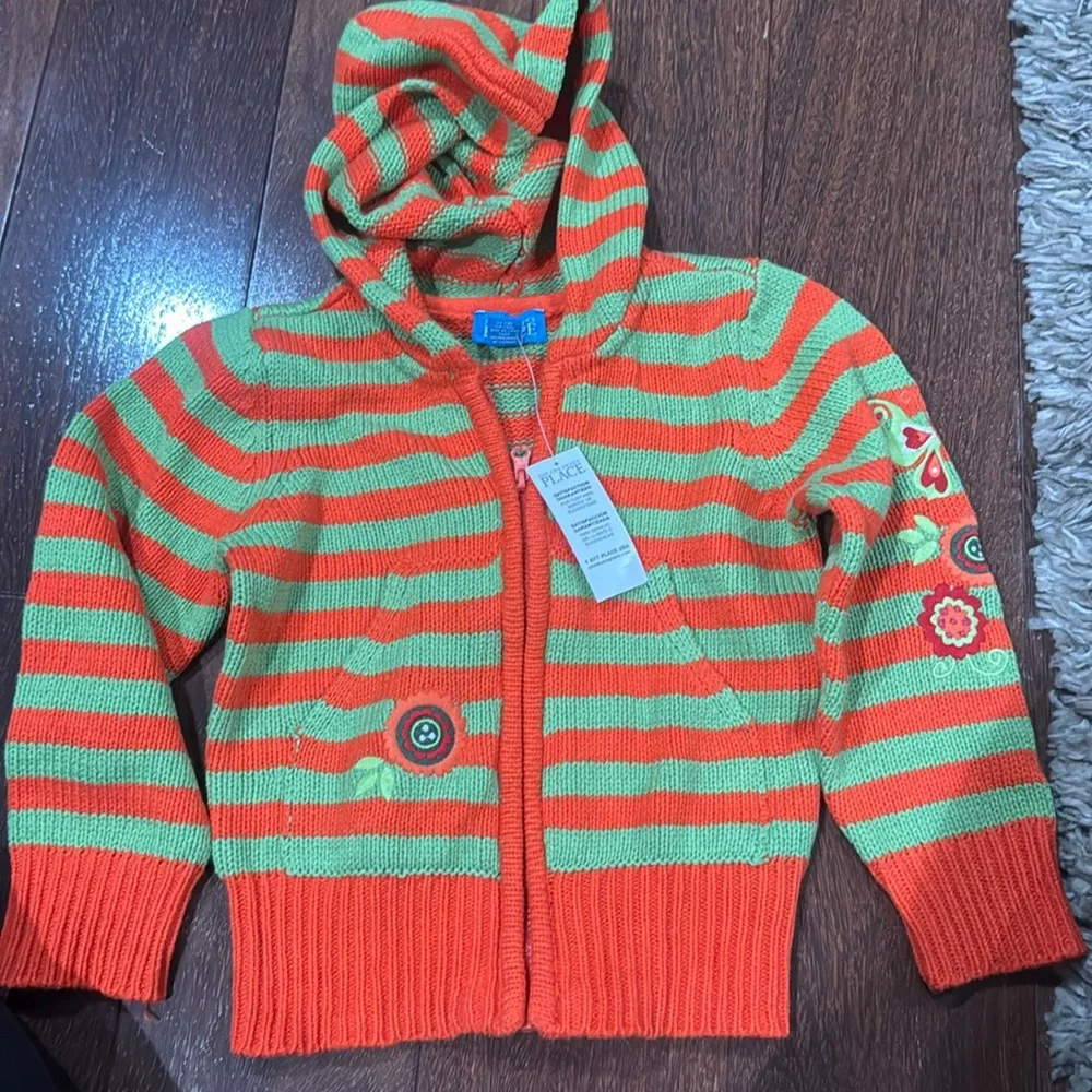 The children place girls sweater size 4t nwt with detail on sleeve and front
